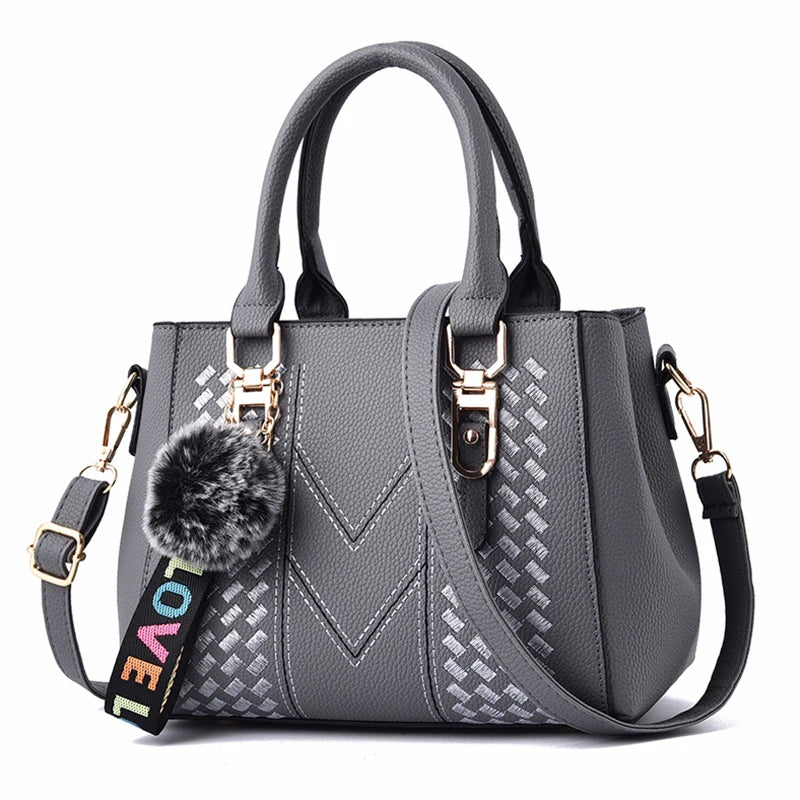 Embroidered Leather Messenger Bag