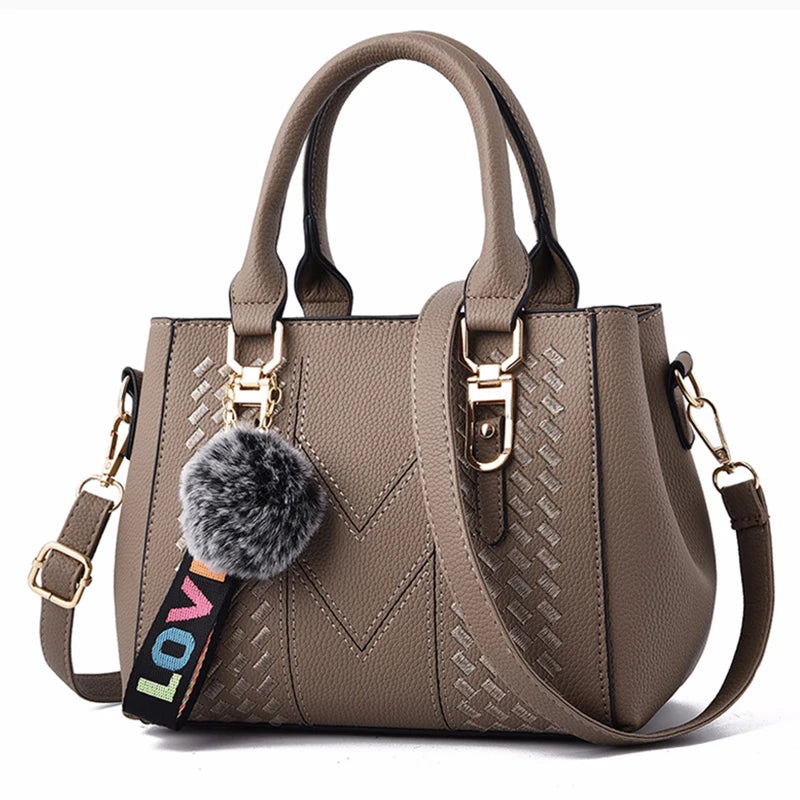 Embroidered Leather Messenger Bag
