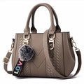 Embroidered Leather Messenger Bag
