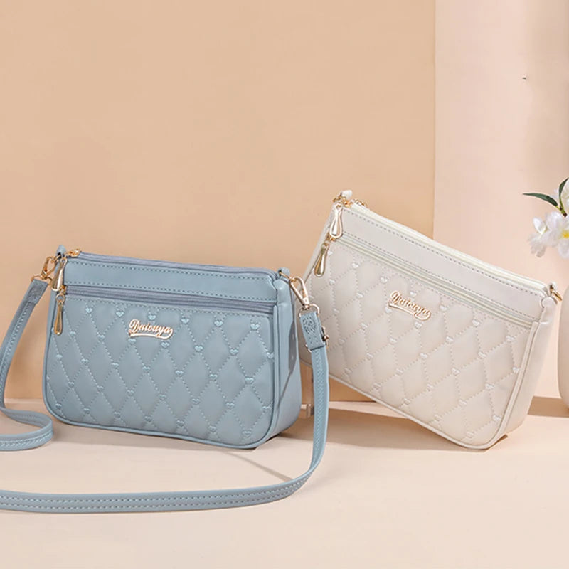 Embroidered Leather Messenger Bag