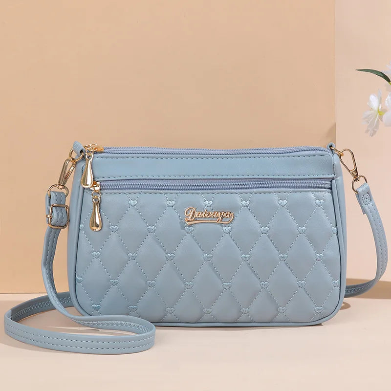Embroidered Leather Messenger Bag