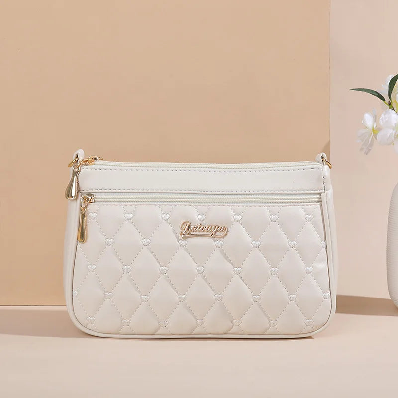 Embroidered Leather Messenger Bag