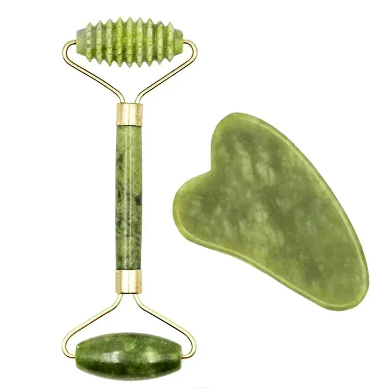 Dual-headed green jade roller and heart-shaped gua sha massage stone.
​