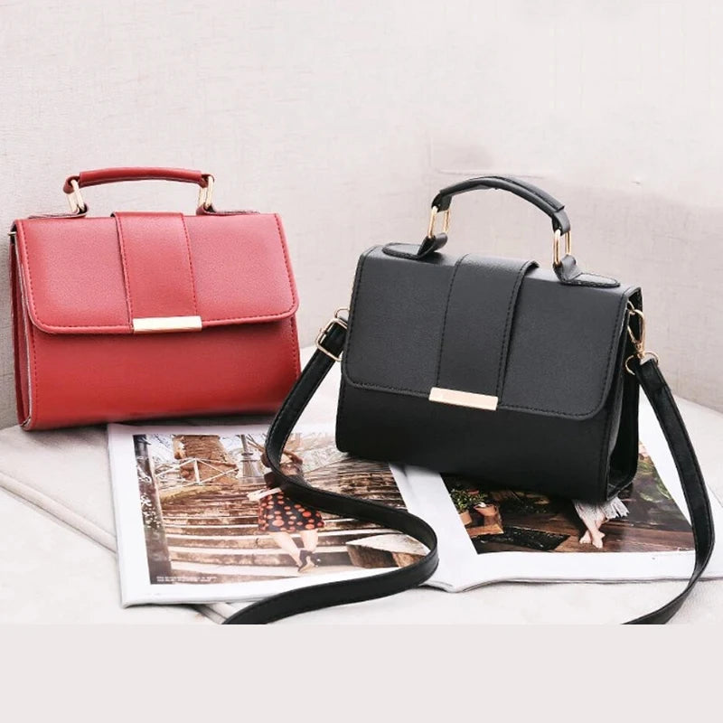 Display of the structured satchel bag in two color options: classic black and deep red